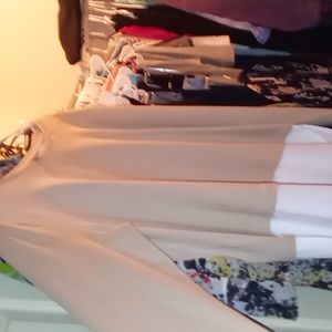 beige and crème colored long sleeve tee